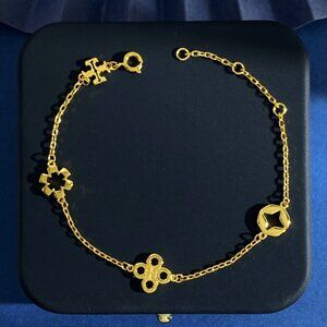 Tory Burch Glossy Round Hollow Flower Clover Bracelet
